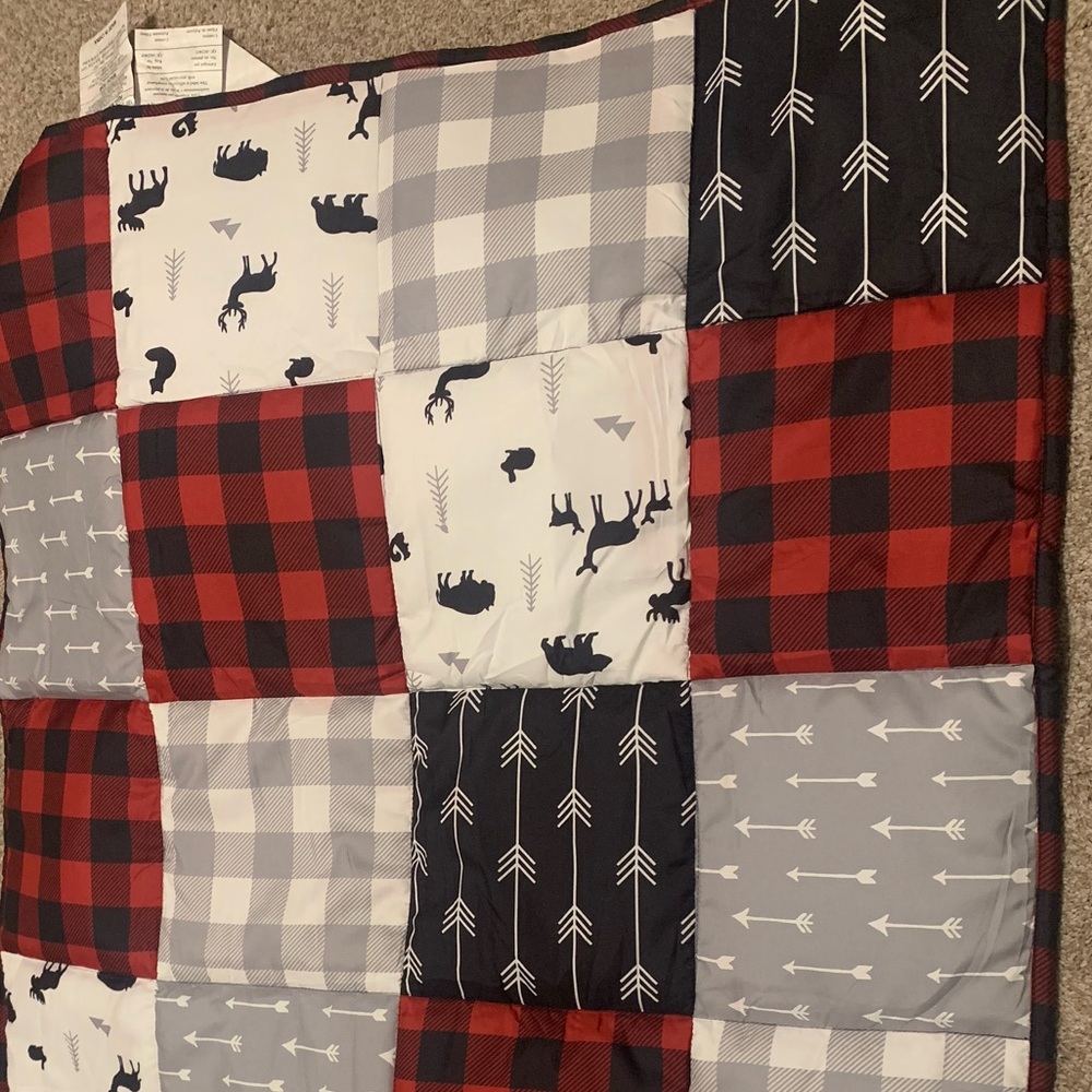 Three piece set crib set: crib quilt, crib sheet, and crib skirt